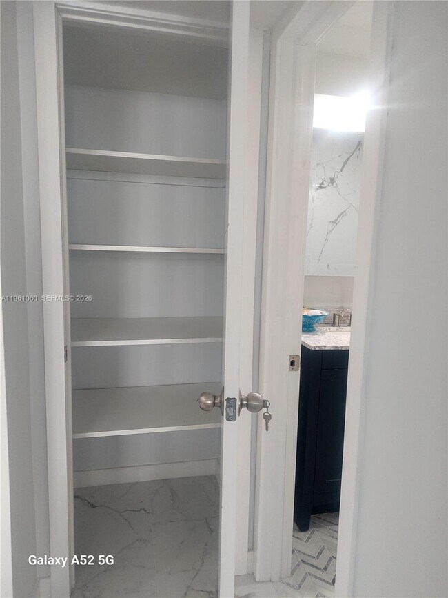 Building Photo - 5005 Collins Ave