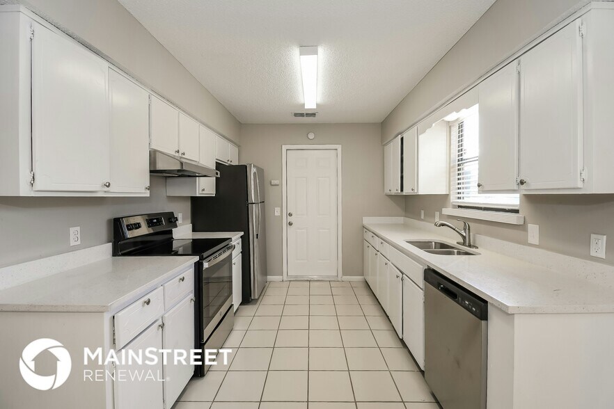 Building Photo - 11023 Poppins Ct