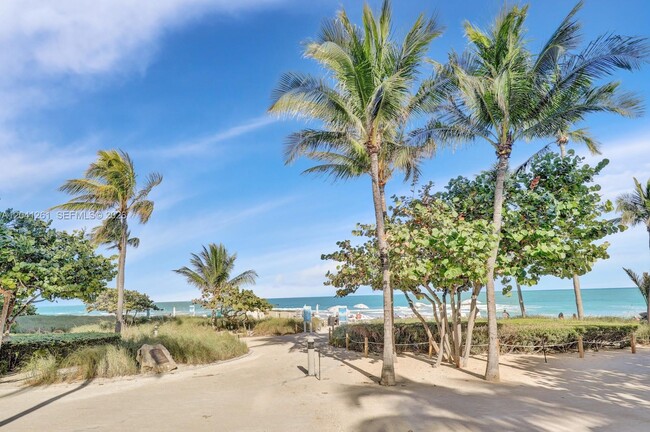 Building Photo - 9601 Collins Ave