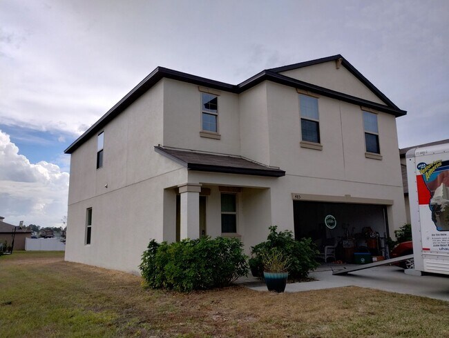 Building Photo - 4-bedroom, 2.5-bath home offering 1,881 sq...