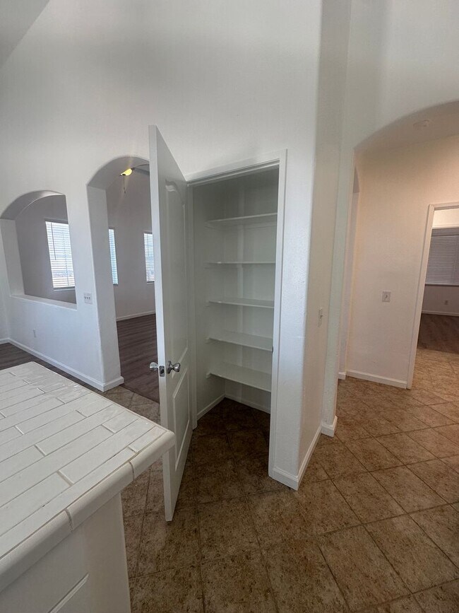 Building Photo - Spacious 4-Bedroom Home with Office, 3 Full Baths, and Modern Amenities