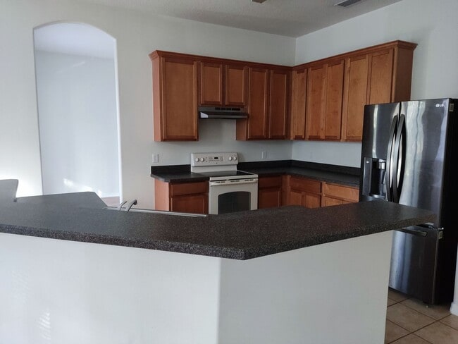 Building Photo - 4/2/2, Beautiful and Spacious!