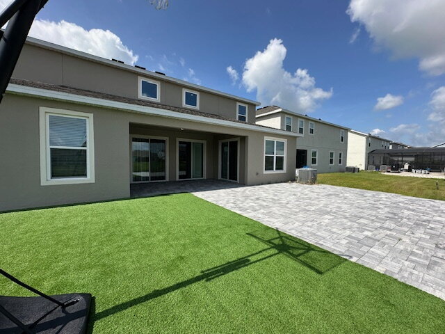 Building Photo - "Spacious Elegance in St. Cloud: 5-Bedroom...