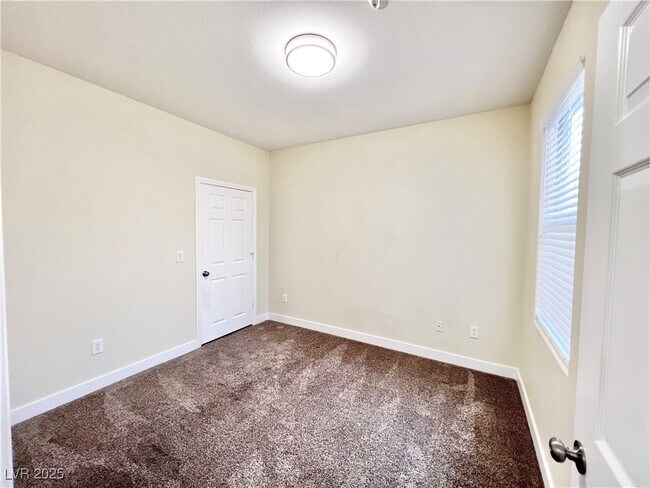 Building Photo - 8000 W Badura Ave