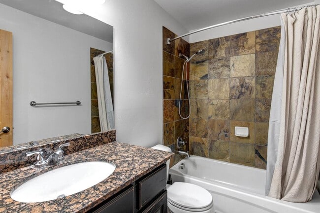 Building Photo - Unfurnished Condo Retreat with Modern Comf...