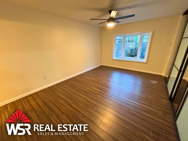 Building Photo - Spacious 5 Bedroom Home Near Victoria Ave with Easy Freeway Access