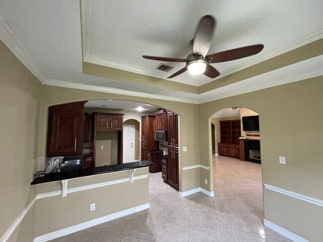 Kitchen, Custom built wood cabinets, black granite with gold flakes counter tops - 600 River Bend Dr