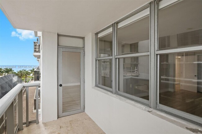 Building Photo - 6039 Collins Ave