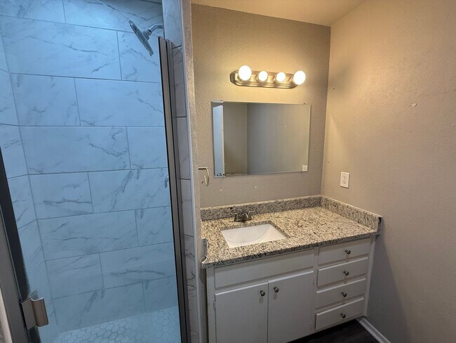 Building Photo - 3 Bed | 2 Bath | 2-Car Garage + Carport – ...
