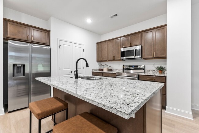 Building Photo - ONE-MONTH FREE RENT! 3-Bed, 2.5-Bath Townhome with Washer & Dryer Included