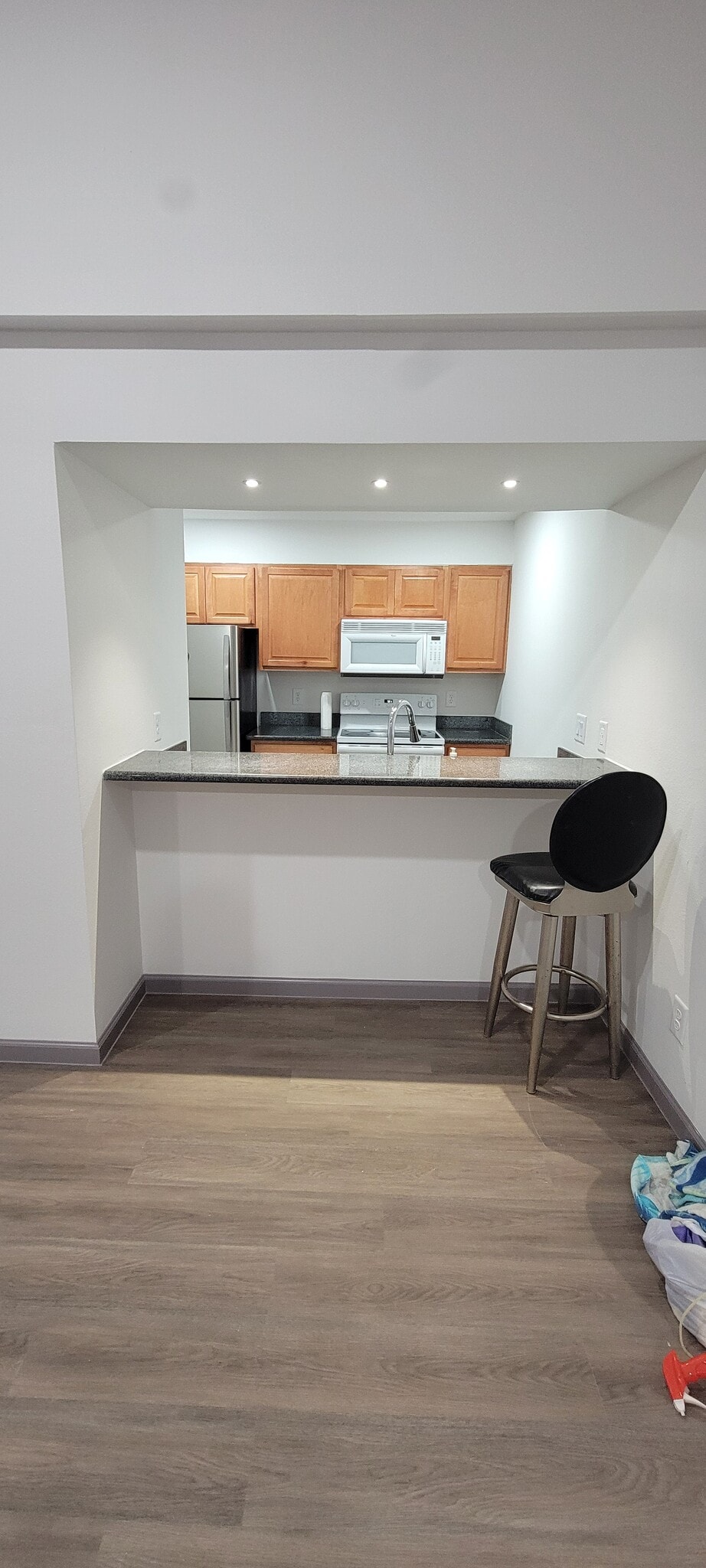 kitchen view from living room - 7142 N Holiday Dr