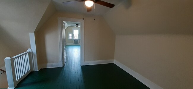 sitting room area on 3rd floor with entrance to bedroom - 7718 Brashear St