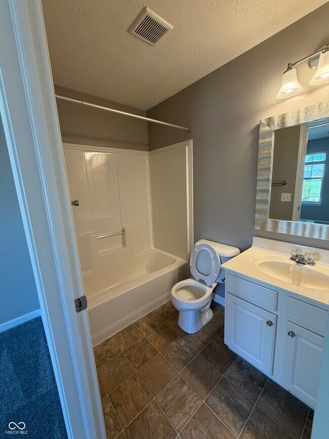 Building Photo - 6305 Schooler Drive