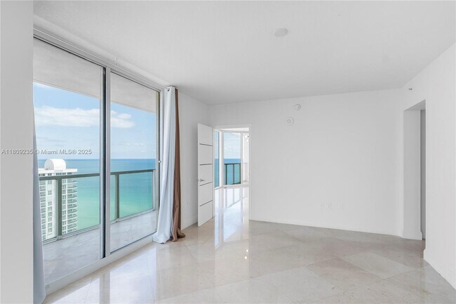 Building Photo - 16699 Collins Ave