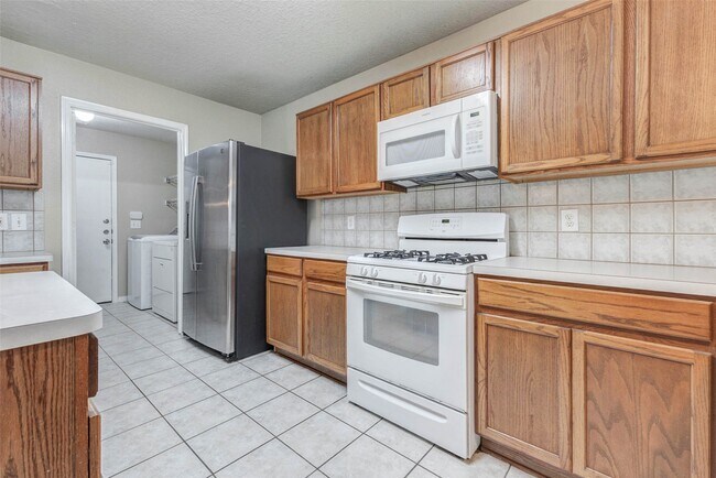 Building Photo - 18327 Atasca Wds Trce