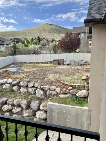 This backyard section is ready for a garden--work your green-thumb magic! - 14487 S Cuchara Way