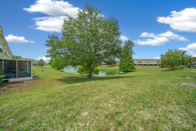 Building Photo - Corner Unit ~ Lake View ~ Maintenance Free...