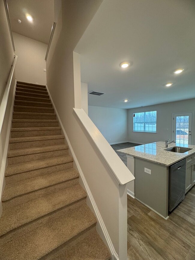 Building Photo - Brand New 4BR 2.5BA Townhome