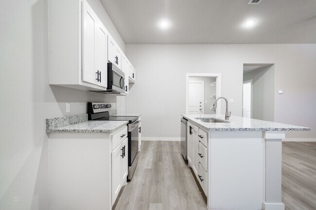 Building Photo - Brand-New Duplexes Near Stargate