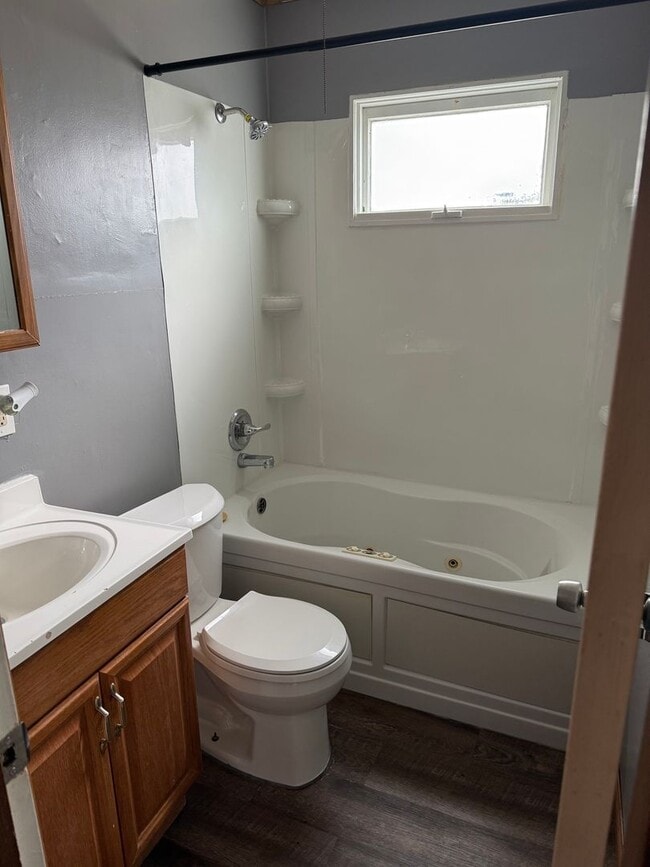 Building Photo - 3BR/1BA with overside detached garage read...