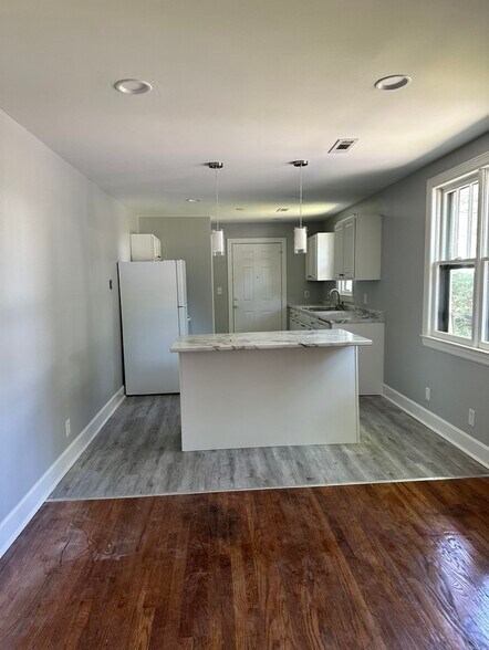 Open kitchen/den concept. - 1826 River Dr