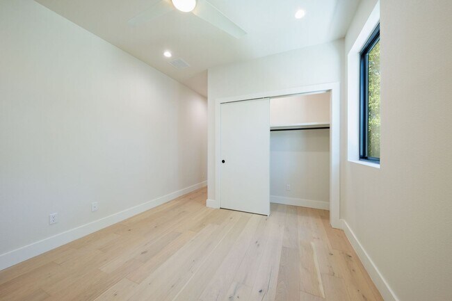 Building Photo - Luxury Redefined: Experience Vibrant Living in this 3-Bedroom Haven in East Austin