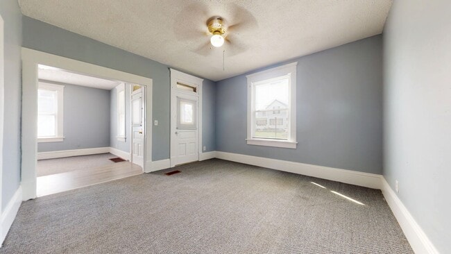 Building Photo - Freshly updated, large garage/small yard