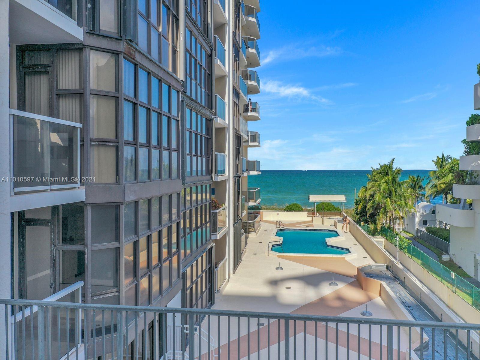 Building Photo - 6423 Collins Ave