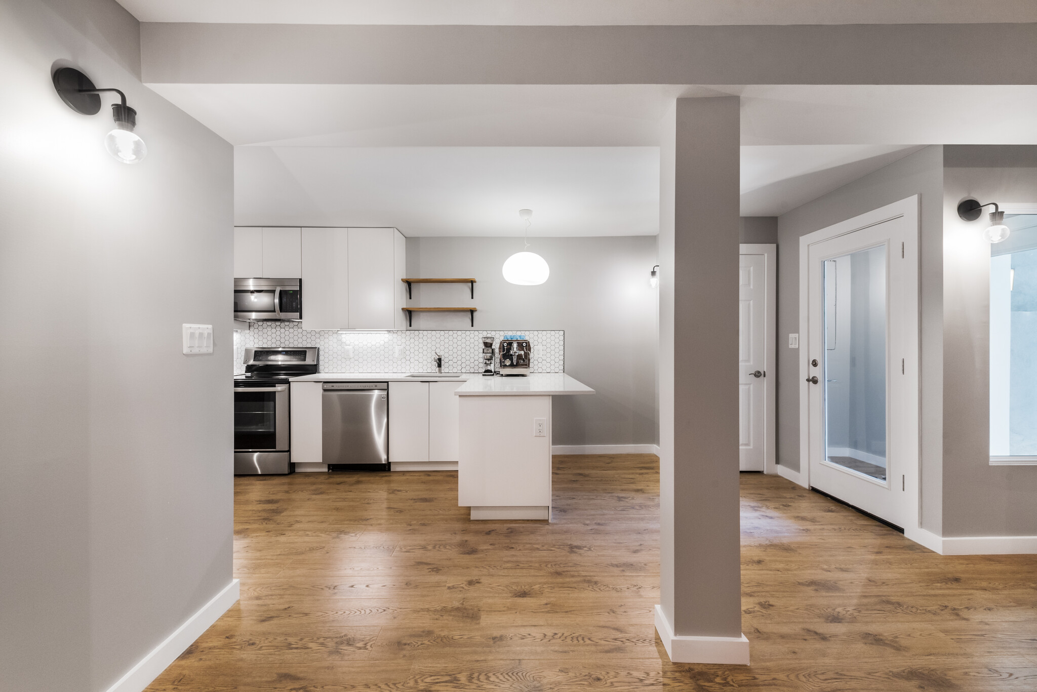 View of kitchen and entry way from dining/living room - 523A Irving St NW