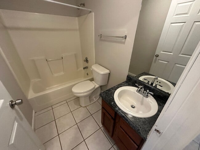 Building Photo - 2 Bedroom 2 bath unit for rent ~ water, sewer, trash, pest control and lawn care included!