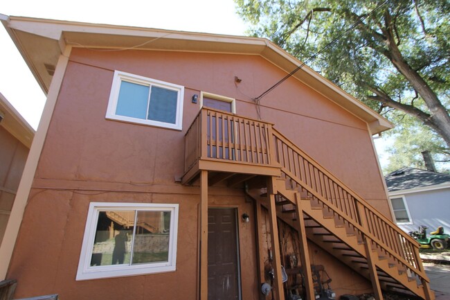 Building Photo - First Floor Two bedroom duplex with Garage...