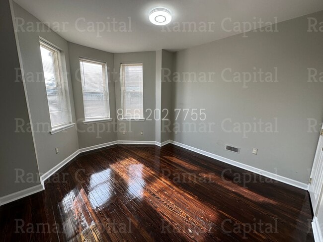 Building Photo - Spacious 3BR Row House with 1.5 bathroom, ...
