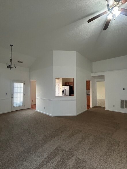 Family Room w/ Pass through Window - 65 Waters Edge Way
