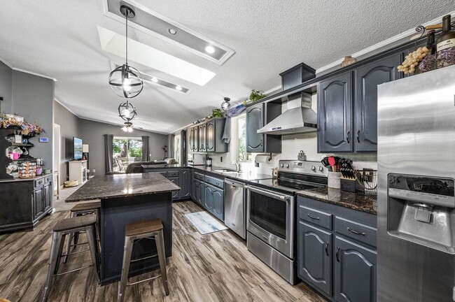 Building Photo - Stunning Rambler on Acreage with Lake Shor...