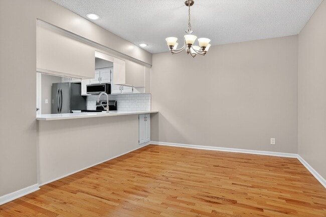 Building Photo - Renovated 3BR/2.5BA Townhome in Blue Valley Schools with Full Basement & 2-Car Garage