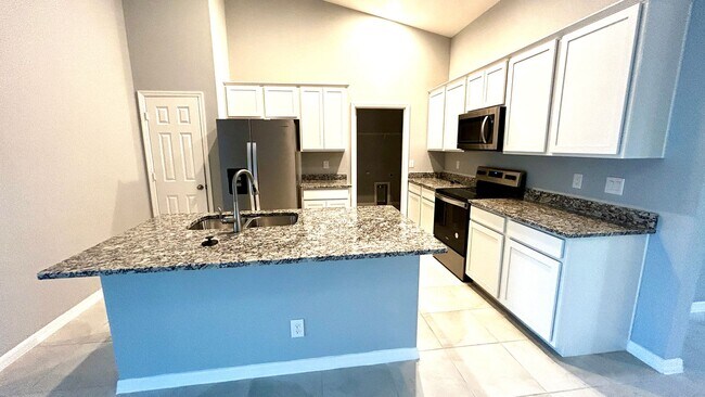 Building Photo - 4 Bedroom 2 Bathroom 2 Car Garage Home - NW Cape Coral - Available Mid April