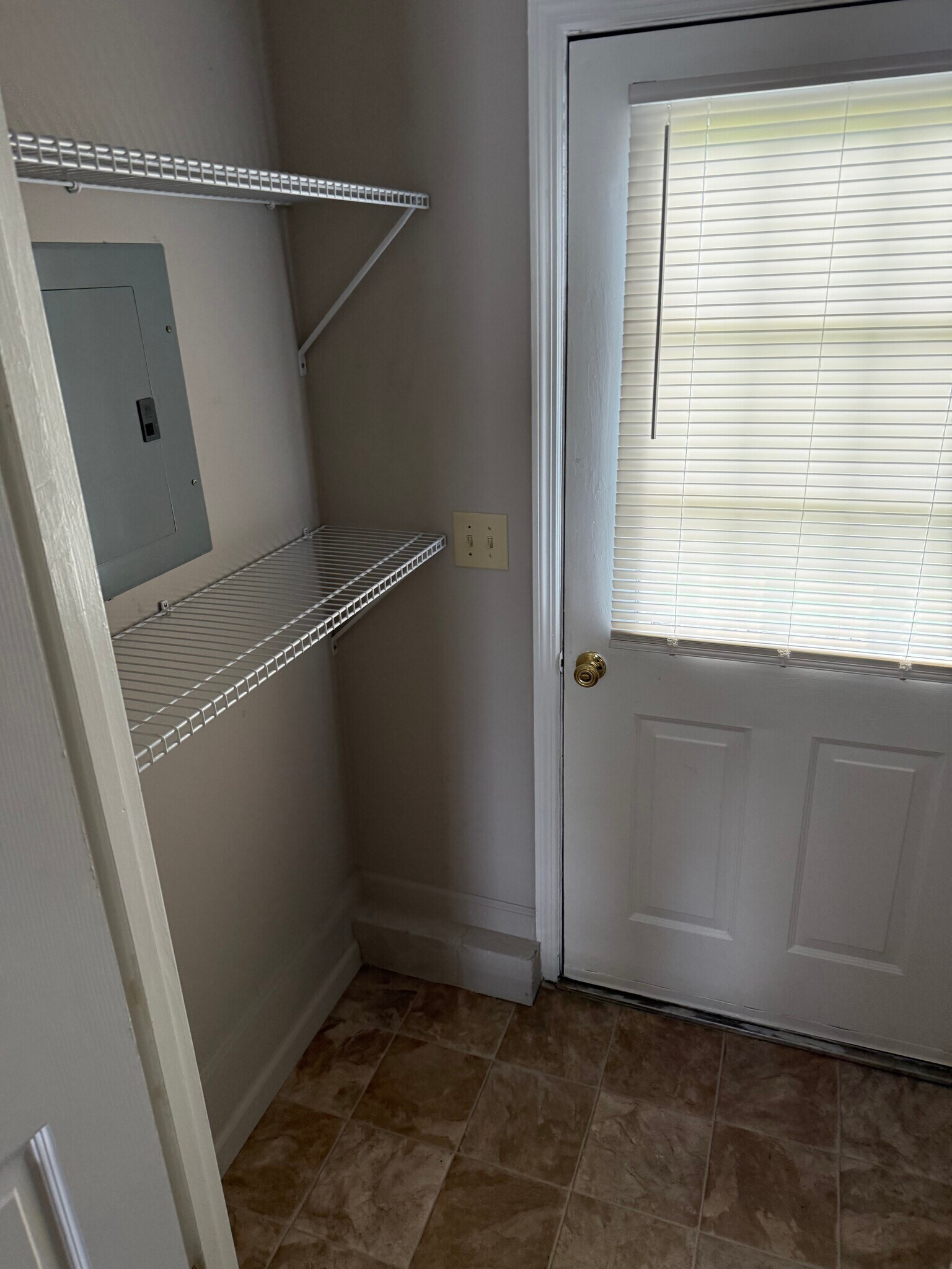 Backdoor and shelving in laundry room - 981 Charlotte Ave