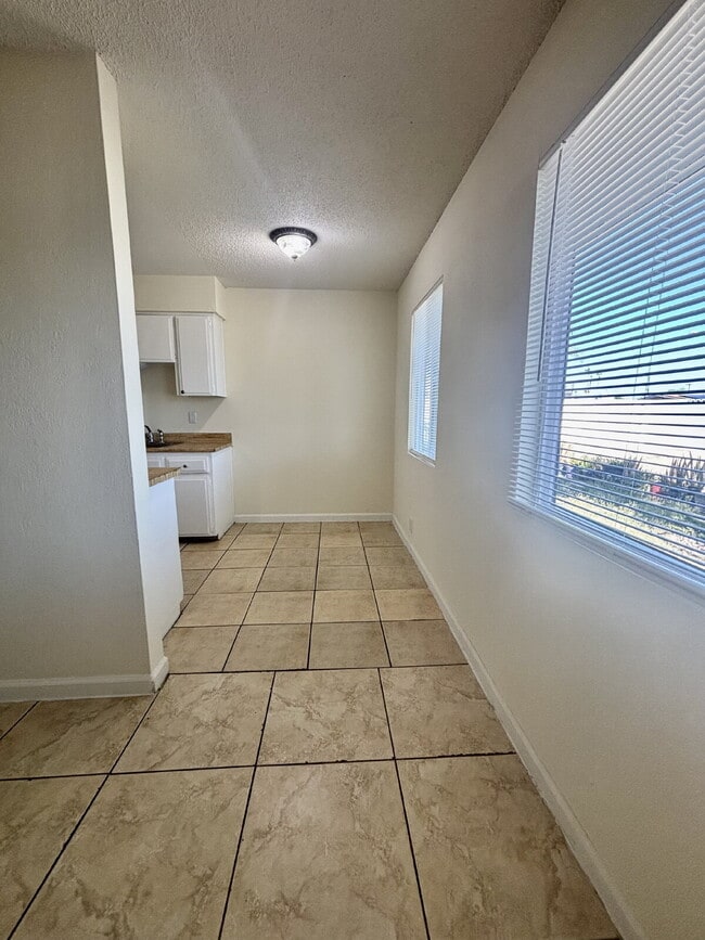 Building Photo - Freshly Painted 2-Bed with Full Utilities,...