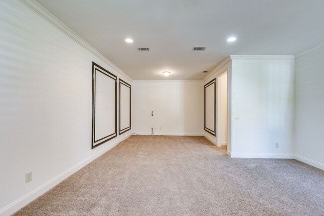 Building Photo - Welcome to this charming end unit townhome