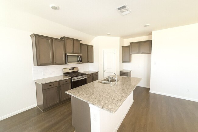 Building Photo - Beautiful 3-Bedroom Modern Home with Cover...