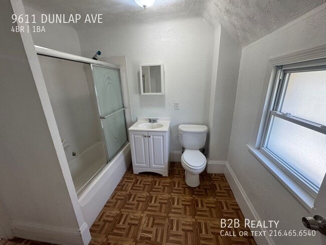 Building Photo - 9611 Dunlap Ave