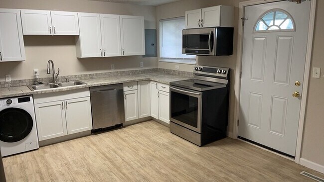 Building Photo - 5983 Harshmanville Rd