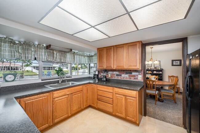 Building Photo - Enjoy the pool or fish/kayak/boat from the...