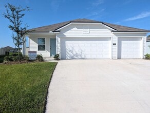 Building Photo - ENTRADA SUBDIVISION - THIS 4/2/3 HOME WITH OVER 2,140 sqft AND FENCED REAR YARD IS NOW AVAILABLE!!