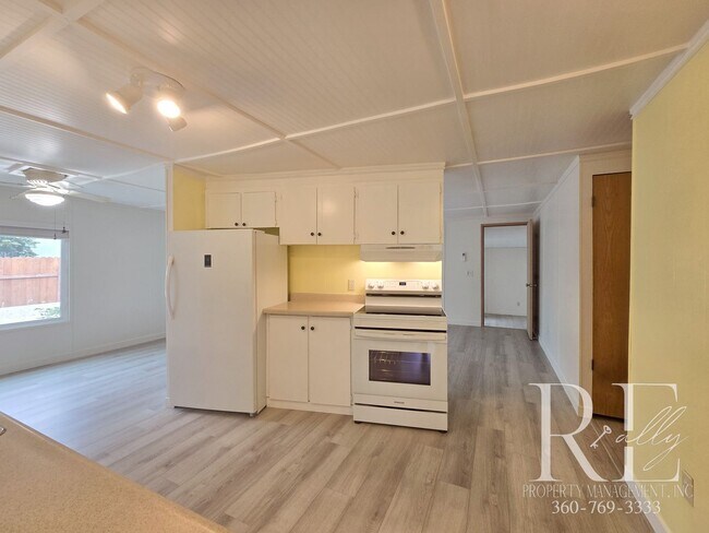 Building Photo - Private Beach Access – Bright, Breezy Livi...