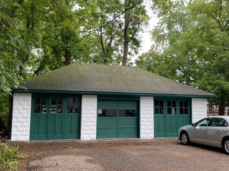 Back of House - Garages for 3 of the Rental Units (Garage Door on Right goes to this Apartment) - 215 Maple St