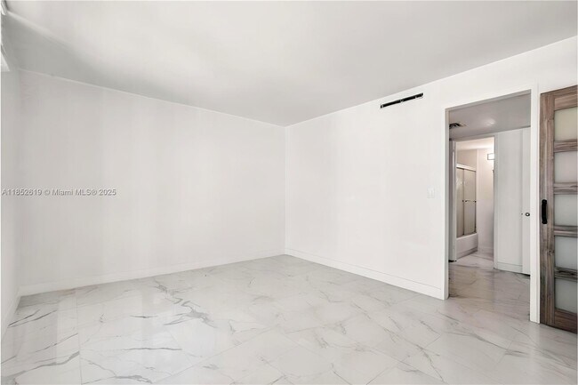 Building Photo - 5055 Collins Ave