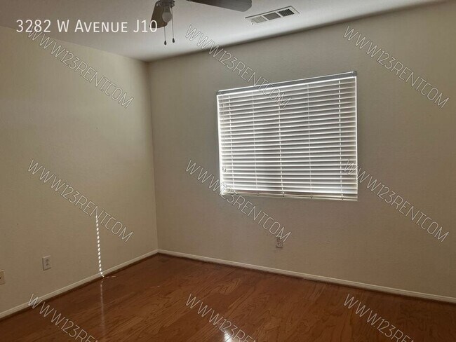 Building Photo - 3282 W Ave J 10