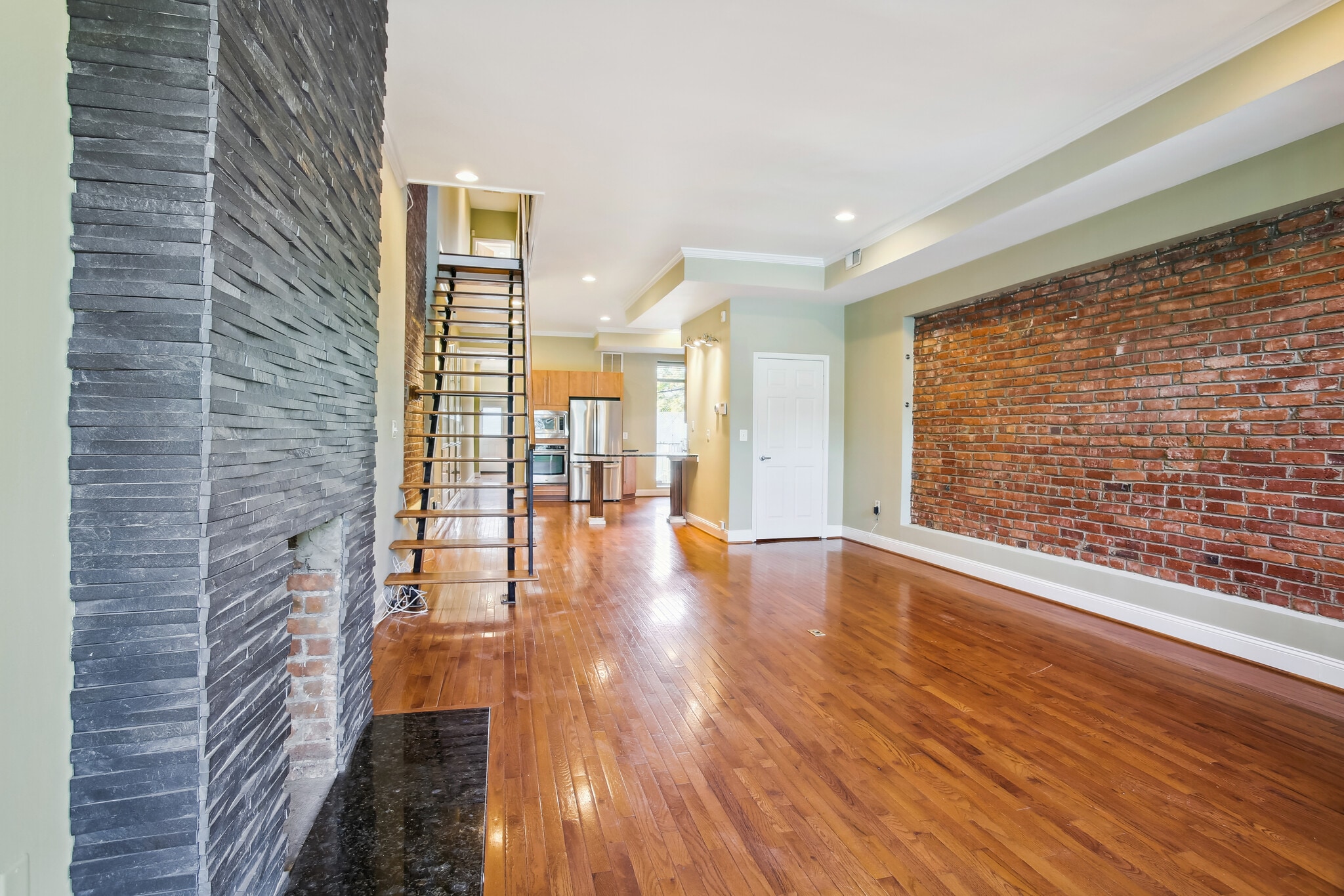 Living room with with floating staircase - 76 R St NW