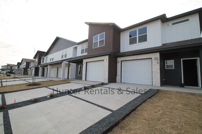 Building Photo - Upscale Four-Bedroom Townhome!